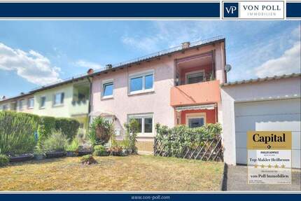 Charmantes Zweifamilienhaus mit 8 Zimmern, Garten & Garage - Platz für zwei Generationen 8 zimmer