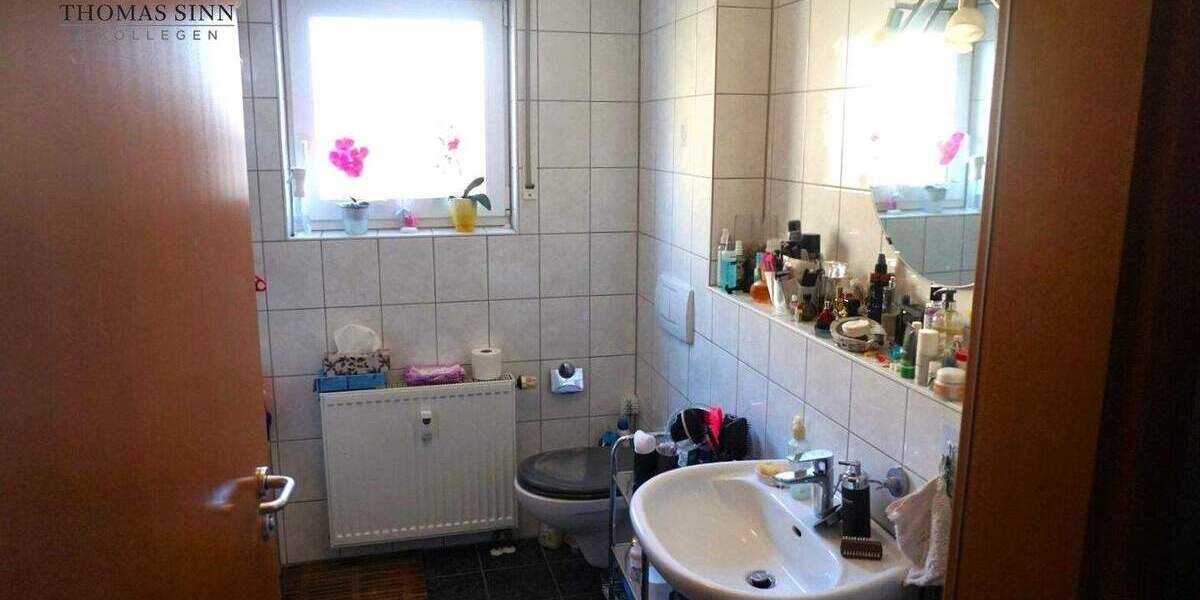 Wunderbar aufgeteilte 2-Zimmer-EG-Wohnung mit tollem Freisitz und kleinem Gartenanteil 2 zimmer