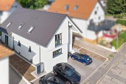 Modernisiertes Zweifamilienhaus A+: Ideal für Familien, Mehrgenerationen oder Anleger 6 zimmer