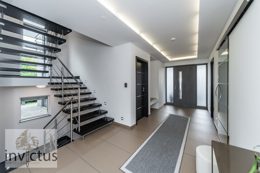 Design trifft Komfort – außergewöhnliches Einfamilienhaus mit Garten und Weinbergblick 8 zimmer