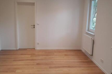 Moderne Dachgeschosswohnung in kernsaniertem 3-Familienhaus 4 zimmer