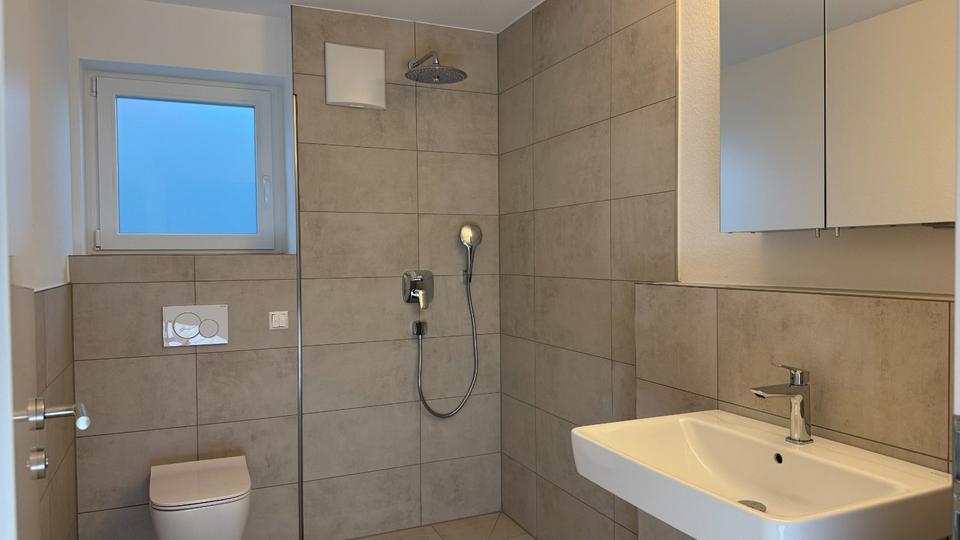 Neubau-Erstbezug: 2-Zimmer-Wohnung mit Terrasse & Privatgarten in 2 zimmer