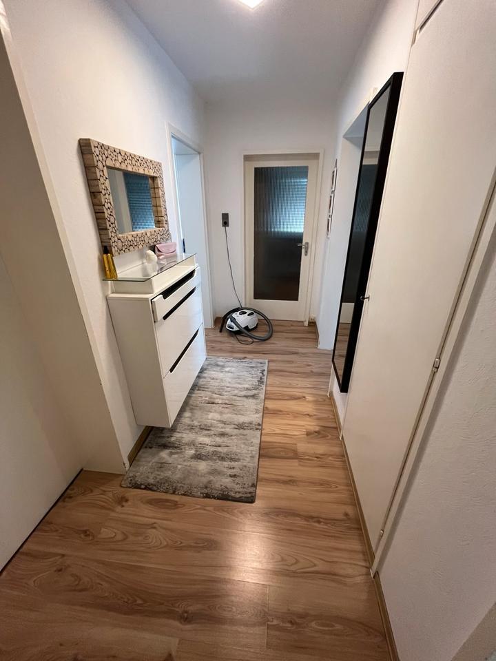 3-Zimmer-Wohnung mit 4. Zimmer im DG, 2 Balkone & Garage
